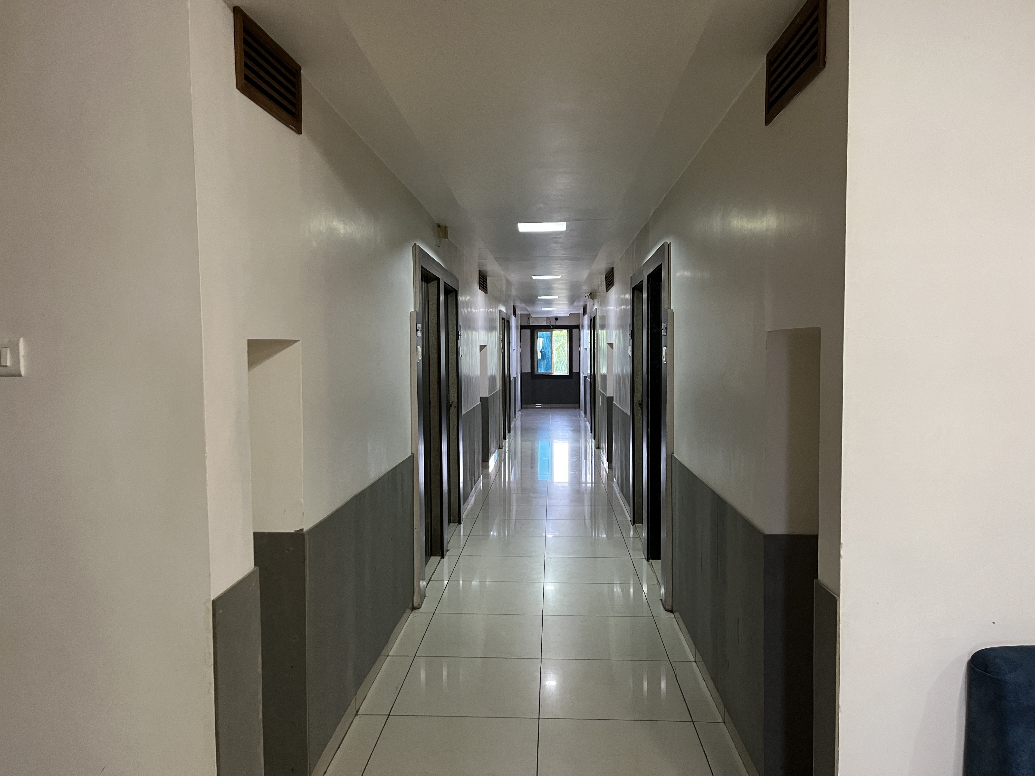 Guest room corridor at Hotel Green Plaza
